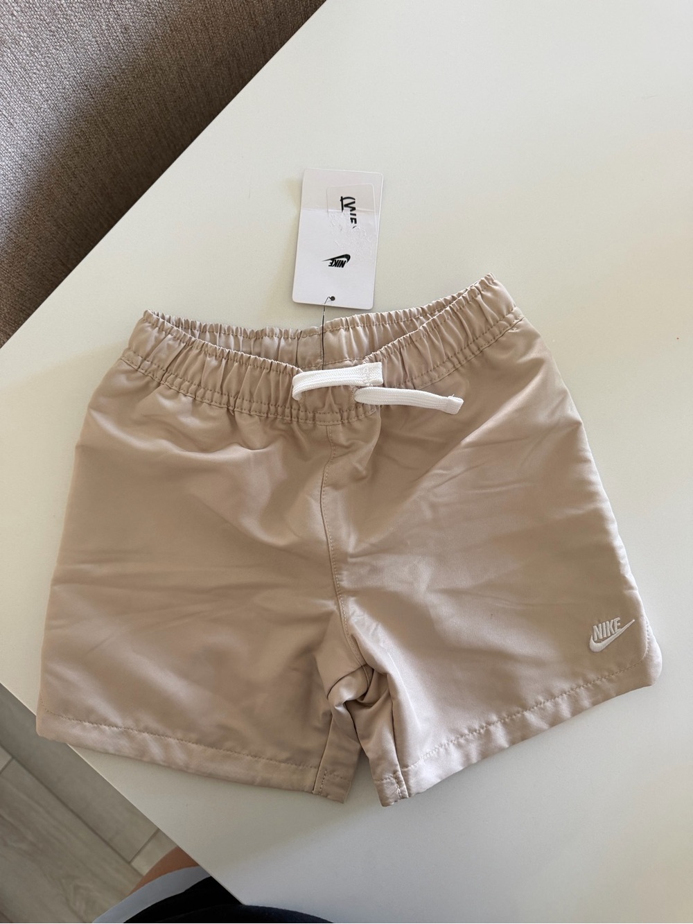 Nike Kids Tan Swim Shorts with White Drawstring